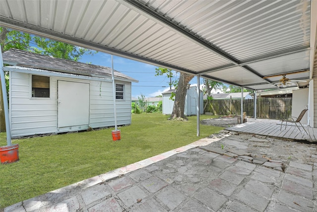 12434 Kathryn St, Houston, TX 77015 - fenced backyard featuring a storage unit and a patio