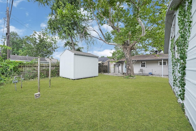 12434 Kathryn St, Houston, TX 77015 - fenced backyard with a storage shed