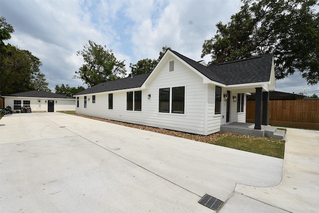 729 Caperton St, Houston, TX 77022 - view of front of property featuring concrete driveway and a shingled roof