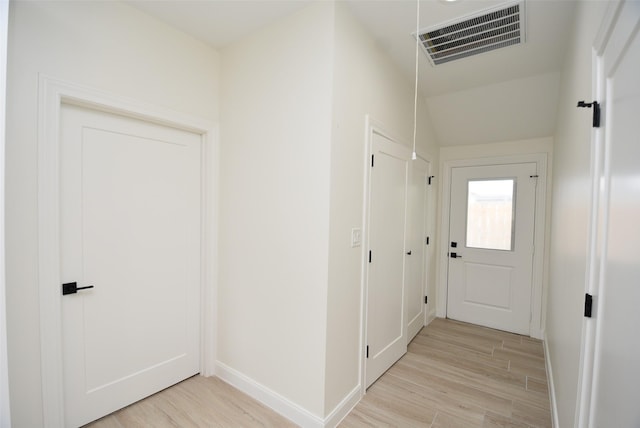 729 Caperton St, Houston, TX 77022 - hallway featuring light wood-style flooring and baseboards