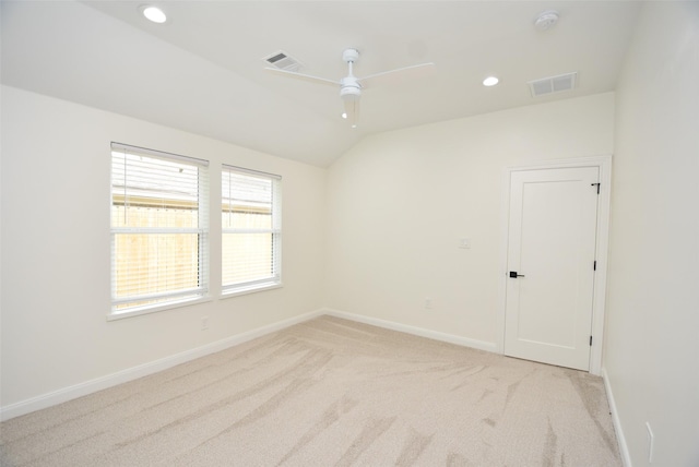 729 Caperton St, Houston, TX 77022 - empty room with light carpet, ceiling fan, a smoke detector, lofted ceiling, and recessed lighting