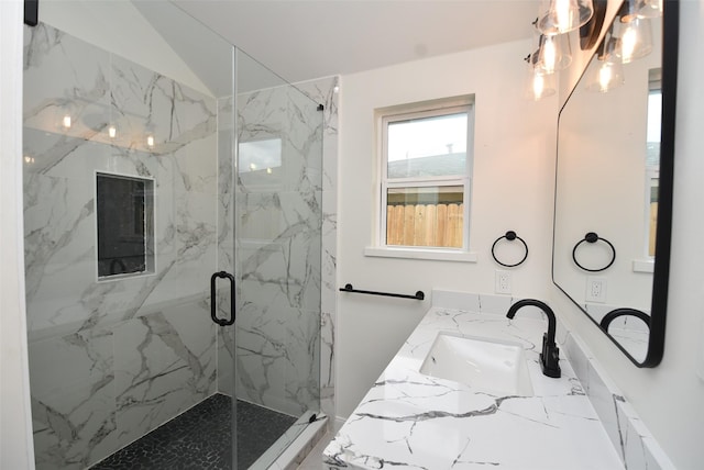 729 Caperton St, Houston, TX 77022 - full bath featuring a marble finish shower, double vanity, marble finish flooring, and lofted ceiling