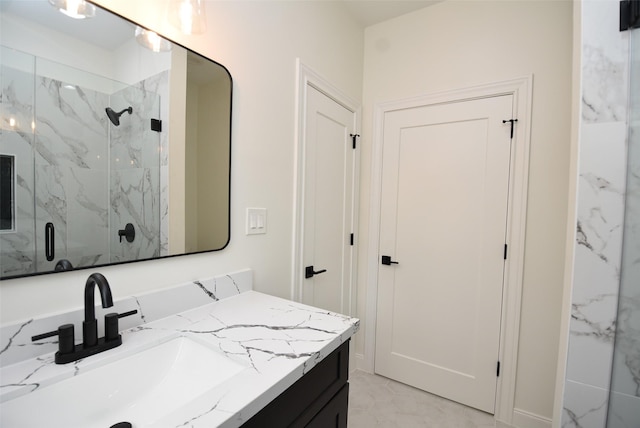 729 Caperton St, Houston, TX 77022 - bathroom with vanity, a marble finish shower, and marble finish floors