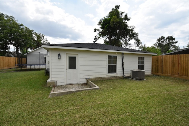 729 Caperton St, Houston, TX 77022 - back of house featuring a trampoline and a fenced backyard