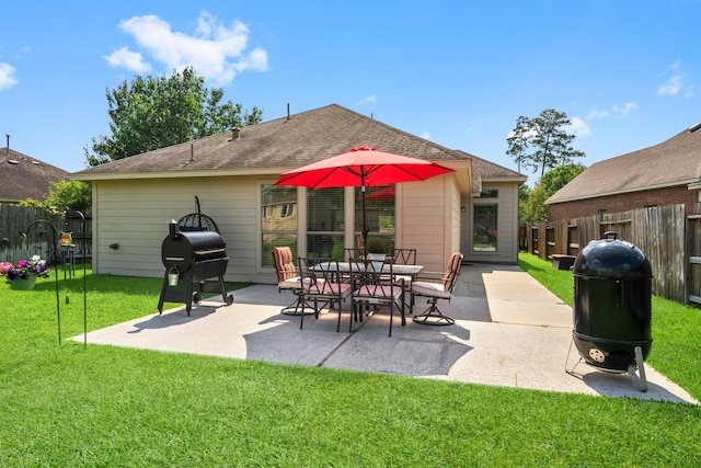 31870 Forest Park Trl, Conroe, TX 77385 - fenced backyard featuring a patio area and a grill