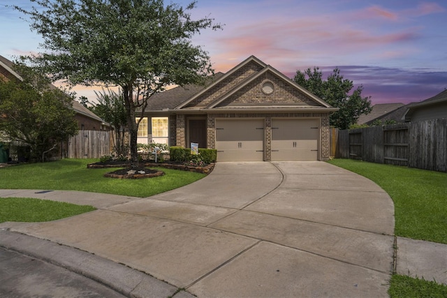31870 Forest Park Trl, Conroe, TX 77385 - view of front of property with brick siding, concrete driveway, and a garage