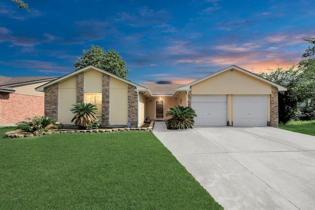 13411 Natasha Ln, Houston, TX 77015 - view of front of home with a garage, a yard, and driveway
