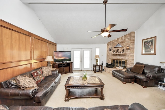 13411 Natasha Ln, Houston, TX 77015 - living room with a ceiling fan, carpet floors, a fireplace, and high vaulted ceiling