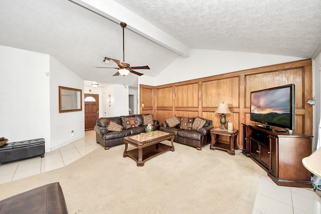 13411 Natasha Ln, Houston, TX 77015 - living area featuring light tile patterned flooring, a ceiling fan, and a textured ceiling