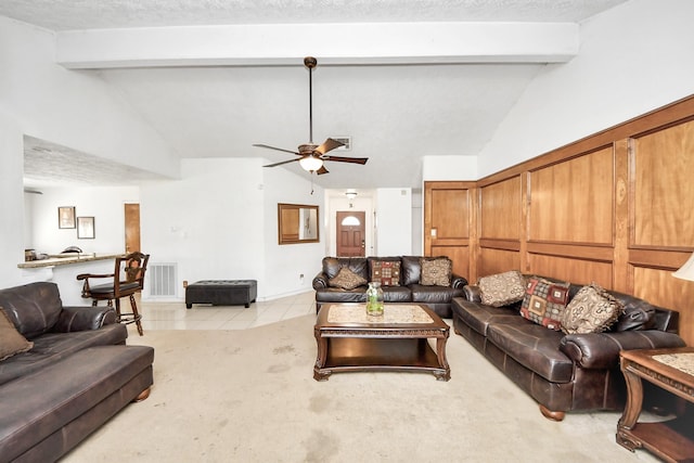 13411 Natasha Ln, Houston, TX 77015 - tiled living area featuring beam ceiling, ceiling fan, and high vaulted ceiling