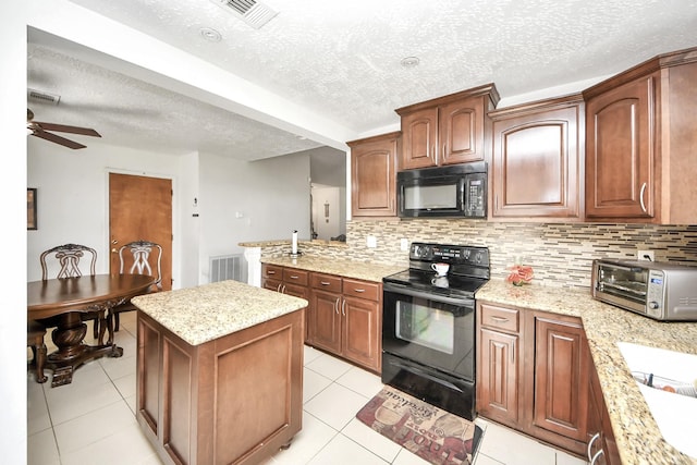 13411 Natasha Ln, Houston, TX 77015 - kitchen with black appliances, a textured ceiling, backsplash, a center island, and ceiling fan