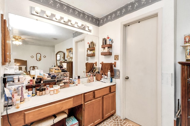 13411 Natasha Ln, Houston, TX 77015 - bathroom featuring ceiling fan and vanity
