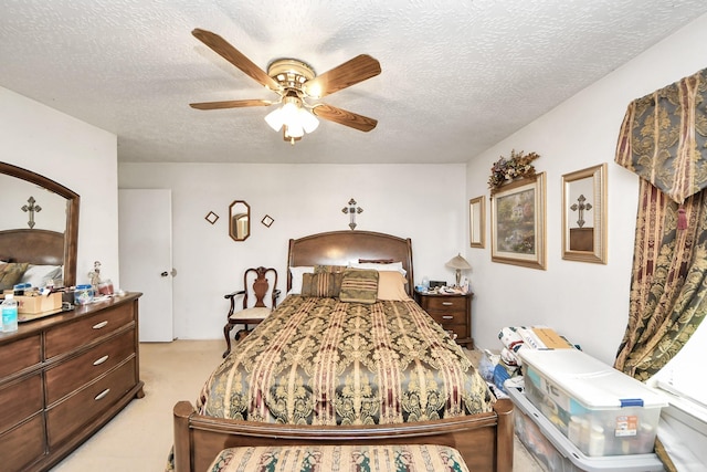 13411 Natasha Ln, Houston, TX 77015 - bedroom featuring light colored carpet, a textured ceiling, and a ceiling fan