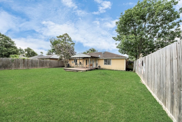 13411 Natasha Ln, Houston, TX 77015 - back of house featuring a deck and a fenced backyard