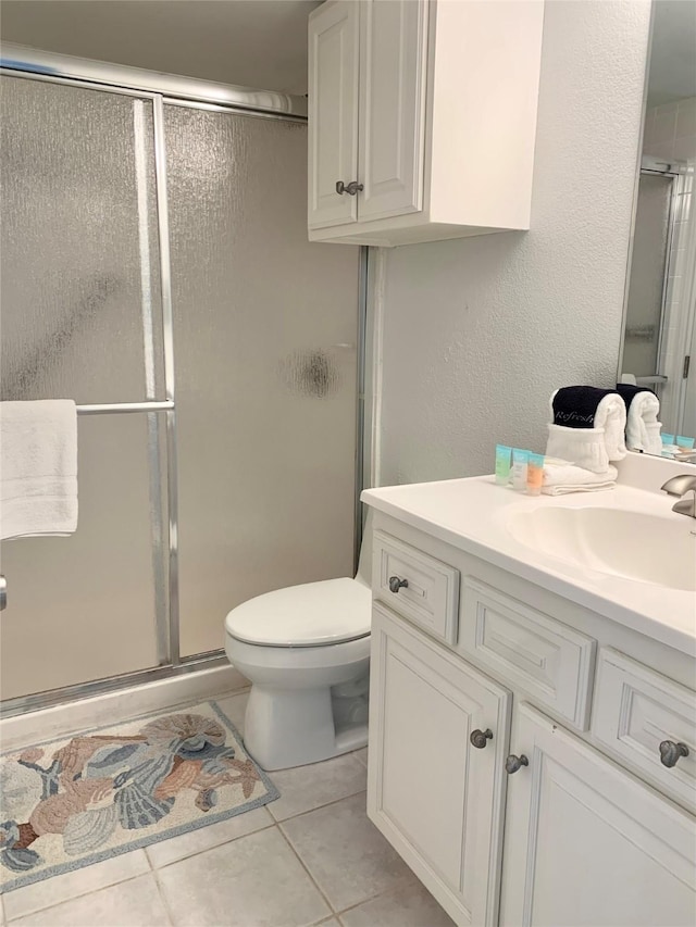 10811 San Luis Pass Rd Unit 1213, Galveston, TX 77554 - full bathroom with vanity, a stall shower, and tile patterned floors