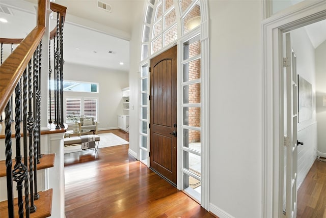 1211 Villmont Ln, Houston, TX 77077 - entryway featuring wood finished floors, stairway, and recessed lighting