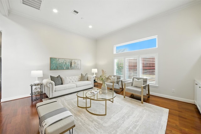 1211 Villmont Ln, Houston, TX 77077 - living area featuring ornamental molding, wood finished floors, and recessed lighting