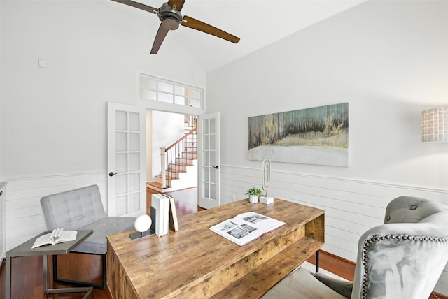 1211 Villmont Ln, Houston, TX 77077 - office area featuring french doors, ceiling fan, a wainscoted wall, high vaulted ceiling, and wooden walls