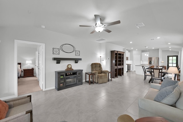 18529 Meadow Point Ln, Montgomery, TX 77316 - living room featuring a ceiling fan, recessed lighting, lofted ceiling, and light tile patterned flooring