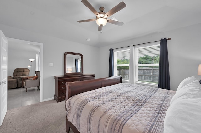 18529 Meadow Point Ln, Montgomery, TX 77316 - carpeted bedroom with ceiling fan and tile patterned flooring