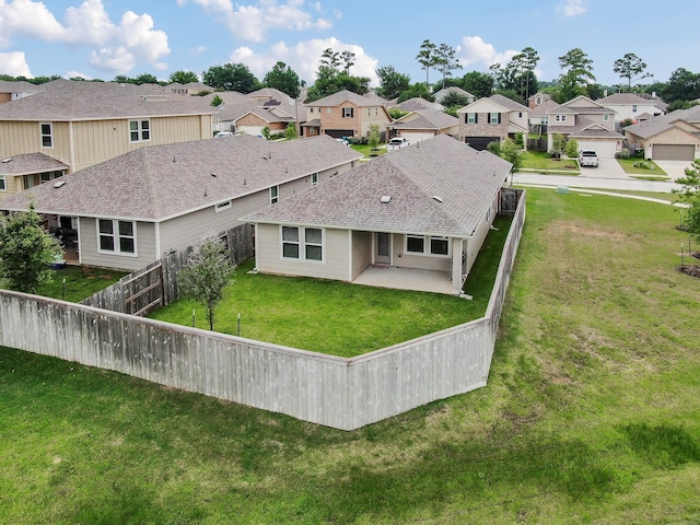 18529 Meadow Point Ln, Montgomery, TX 77316 - rear view of house featuring a residential view, a patio, a fenced backyard, and a shingled roof