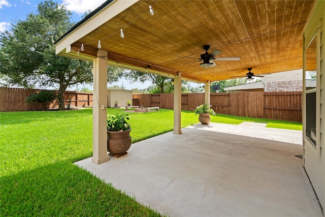 12106 Hawthorne Hill Cir, Humble, TX 77346 - fenced backyard with a patio and a ceiling fan