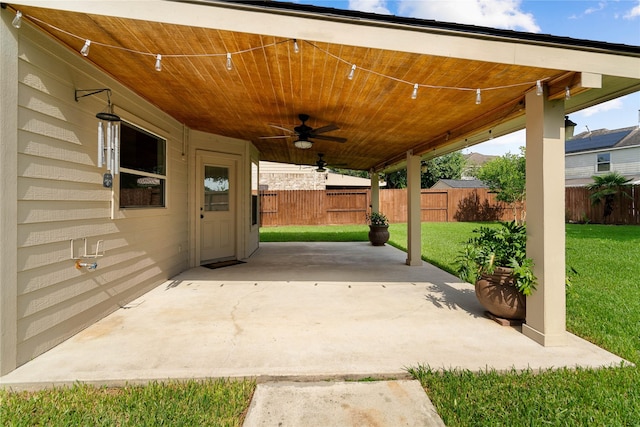 12106 Hawthorne Hill Cir, Humble, TX 77346 - fenced backyard featuring ceiling fan and a patio area