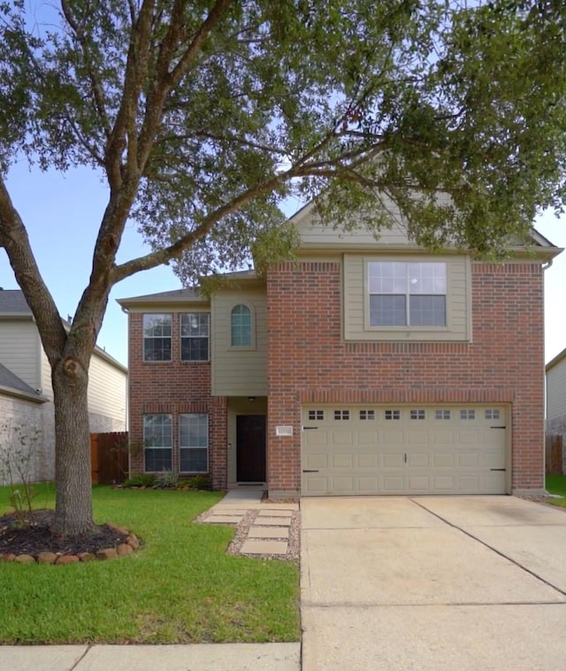 12106 Hawthorne Hill Cir, Humble, TX 77346 - traditional home with brick siding, an attached garage, driveway, and a front yard
