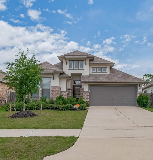 25446 Fossa Dr, Tomball, TX 77375 - prairie-style home featuring stucco siding, driveway, and brick siding