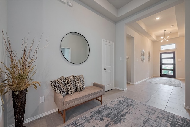 25446 Fossa Dr, Tomball, TX 77375 - tiled foyer with a raised ceiling, a chandelier, and recessed lighting