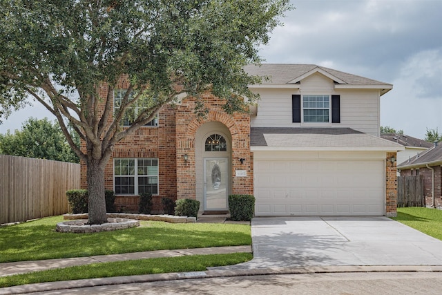 18107 Mayfield Meadow Ln, Richmond, TX 77407 - traditional home with concrete driveway, brick siding, an attached garage, and a shingled roof