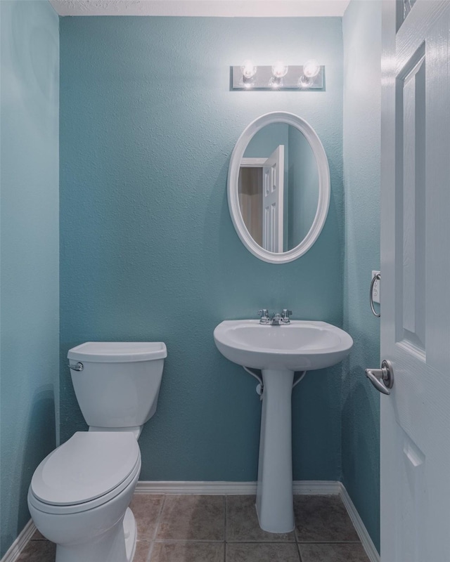 18107 Mayfield Meadow Ln, Richmond, TX 77407 - half bath featuring toilet and tile patterned flooring