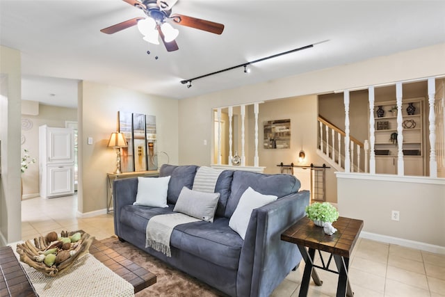 2151 Middle Creek Dr, Houston, TX 77339 - living room with light tile patterned floors, ceiling fan, and rail lighting