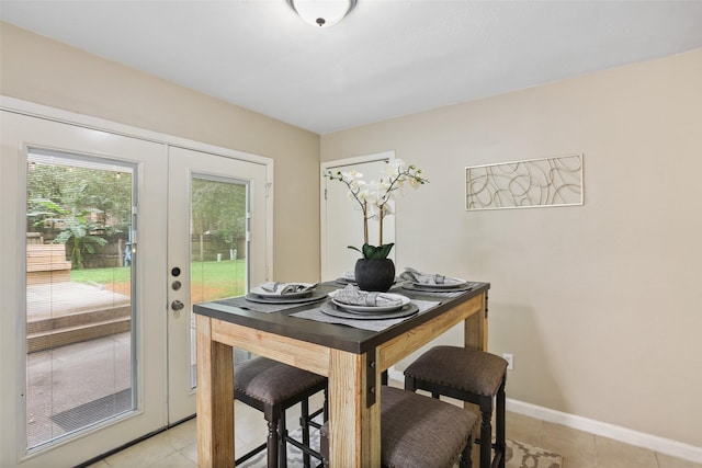 2151 Middle Creek Dr, Houston, TX 77339 - dining area featuring light tile patterned floors