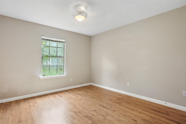 2151 Middle Creek Dr, Houston, TX 77339 - spare room with light wood-style floors and a ceiling fan