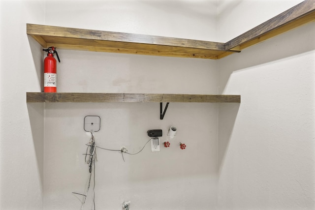 2151 Middle Creek Dr, Houston, TX 77339 - laundry view of a fire extinguisher