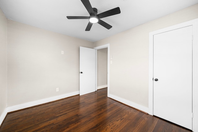 5519 Chapman St, Houston, TX 77009 - unfurnished bedroom featuring dark wood-style floors and a ceiling fan