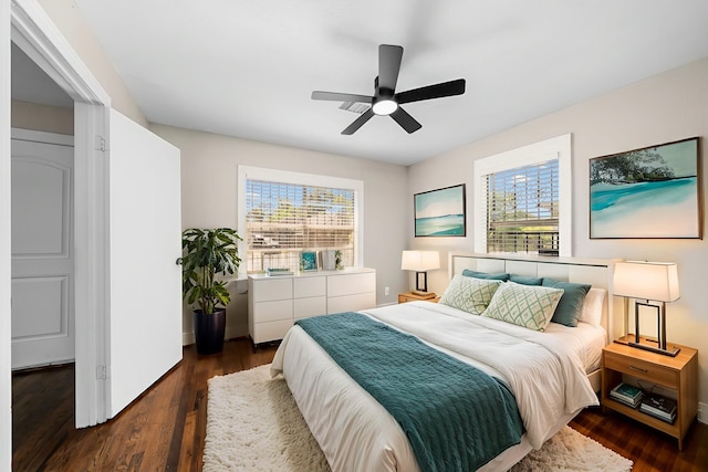 5519 Chapman St, Houston, TX 77009 - bedroom featuring multiple windows, wood finished floors, and a ceiling fan