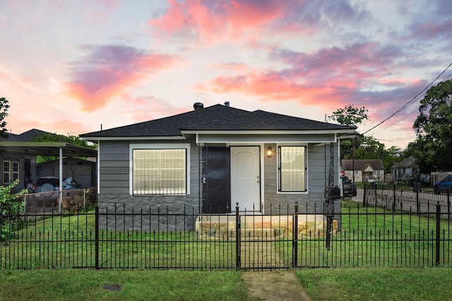 5519 Chapman St, Houston, TX 77009 - bungalow-style home featuring a fenced front yard and roof with shingles