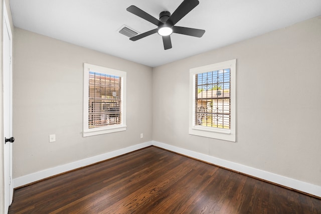 5519 Chapman St, Houston, TX 77009 - empty room with dark wood-style flooring and a ceiling fan