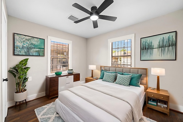 5519 Chapman St, Houston, TX 77009 - bedroom featuring multiple windows, dark wood-type flooring, and ceiling fan