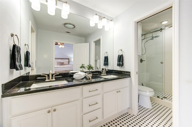 1964 Augusta Dr, Houston, TX 77057 - bathroom featuring double vanity, a stall shower, connected bathroom, and ceiling fan
