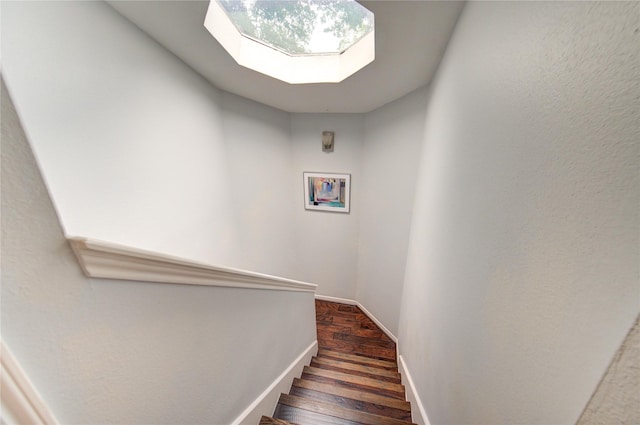 1964 Augusta Dr, Houston, TX 77057 - stairs with wood finished floors and a skylight