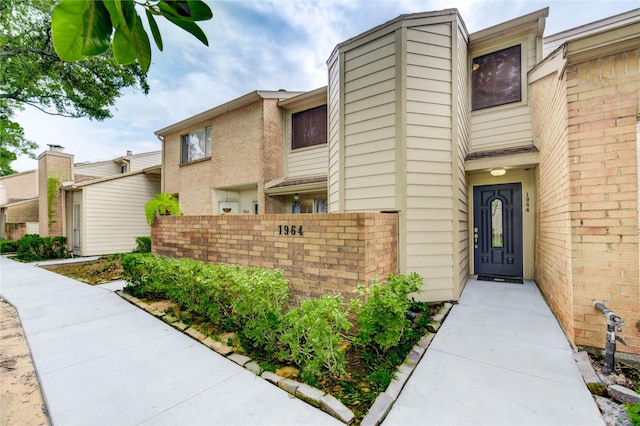 1964 Augusta Dr, Houston, TX 77057 - property entrance with brick siding