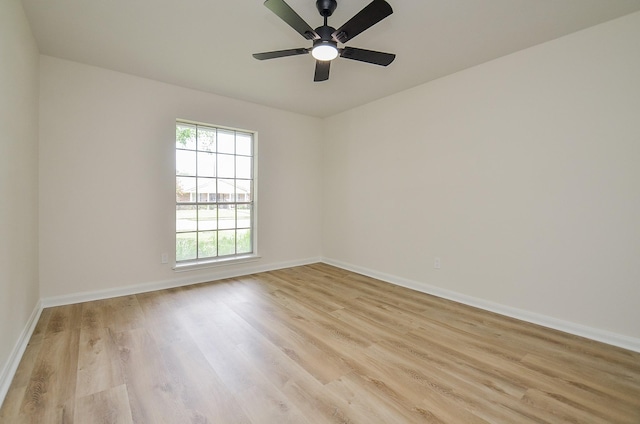 10623 Longmont Dr, Houston, TX 77042 - empty room featuring light wood-style flooring and ceiling fan