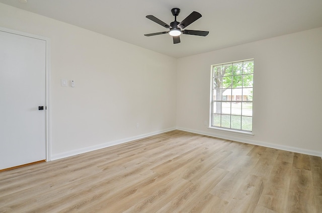 10623 Longmont Dr, Houston, TX 77042 - empty room featuring light wood-style floors and a ceiling fan