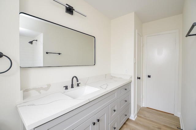 10623 Longmont Dr, Houston, TX 77042 - full bathroom with vanity and wood finished floors
