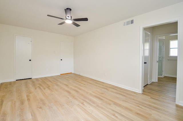 10623 Longmont Dr, Houston, TX 77042 - unfurnished room featuring ceiling fan and light wood-style floors