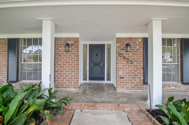 10623 Longmont Dr, Houston, TX 77042 - entrance to property featuring brick siding and a porch