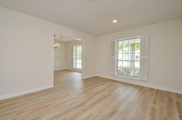 10623 Longmont Dr, Houston, TX 77042 - unfurnished room featuring a chandelier, light wood-type flooring, and recessed lighting